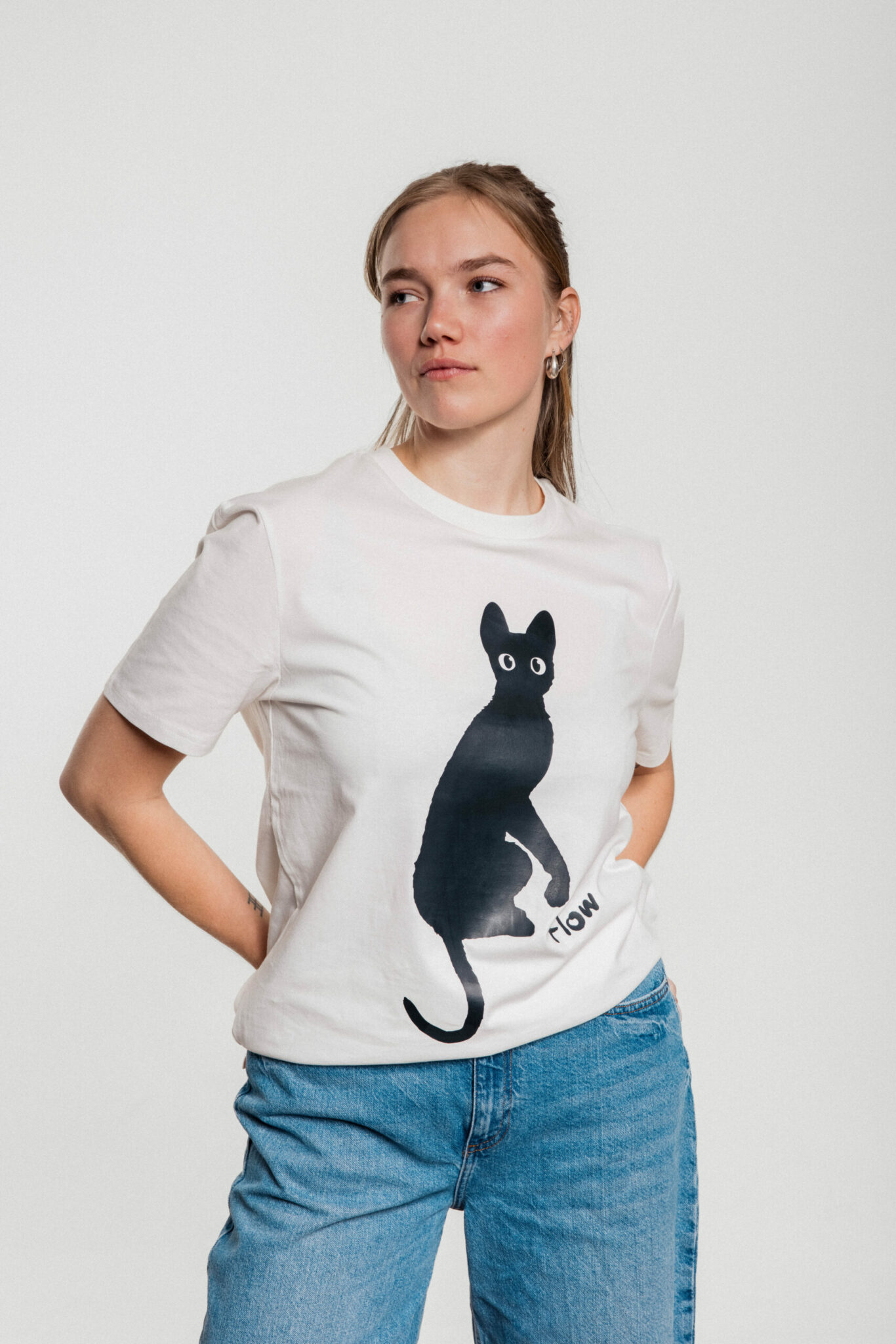 Official T-shirt for the award-winning animated film FLOW | Off-white | Cat on front